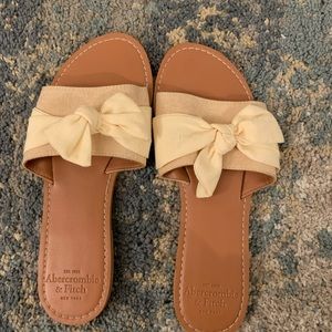 yellow bowed sandals